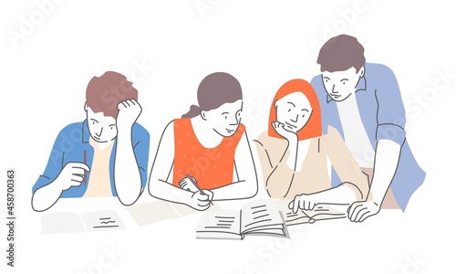 Young people sitting at the table and learning.