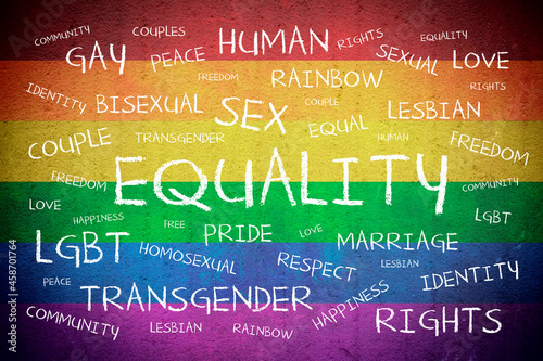 Equality concept word cloud for lgbtq on colorful rainbow colored flag background photo