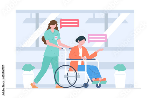 Nurses treating patients by wheelchair