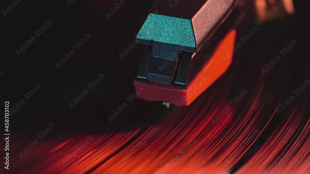 Needle detail on vinyl record on turntable 3