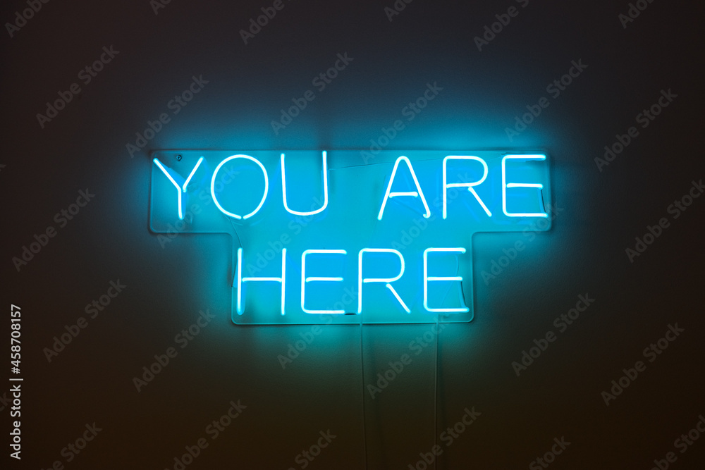 Neon sign 'you are here' Neon sign 'you are here'