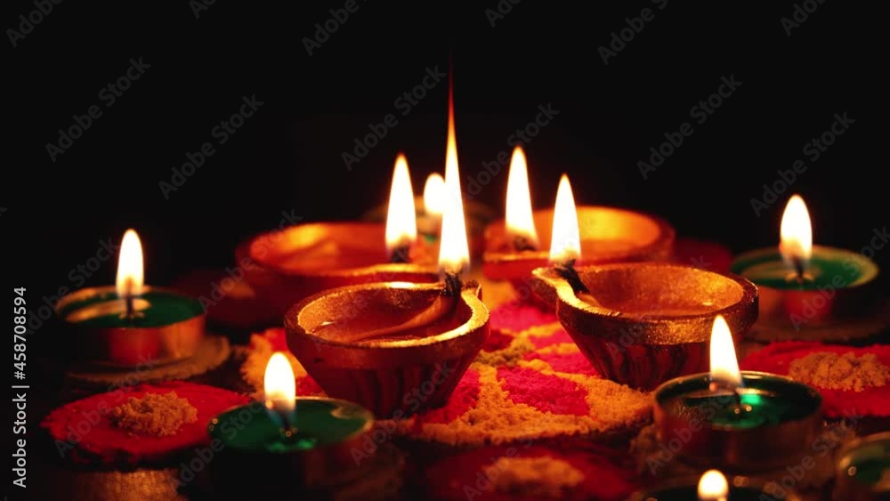 Diwali celebration Indian festival of lights Diya oil lamp and colors Rangoli decoration flowers flowerbed 4K footage video greetings Dipavali Hindu festival North India, Mumbai Delhi India Diwali celebration Indian festival of lights Diya oil lamp and colors Rangoli decoration flowers flowerbed 4K footage video greetings Dipavali Hindu festival North India, Mumbai Delhi India