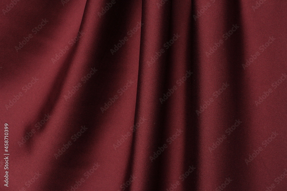 Obraz premium Draped vinous silk fabric background