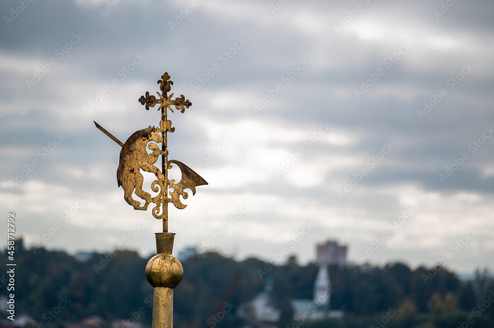 coat of arms heraldry, the emblem of the ancient Russian city of Yaroslavl. golden bear with an axe, weather vane
