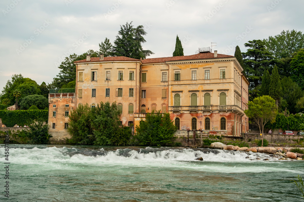 View on a building along the Brenta river in Bassano del Grappa, Vicenza - Italy