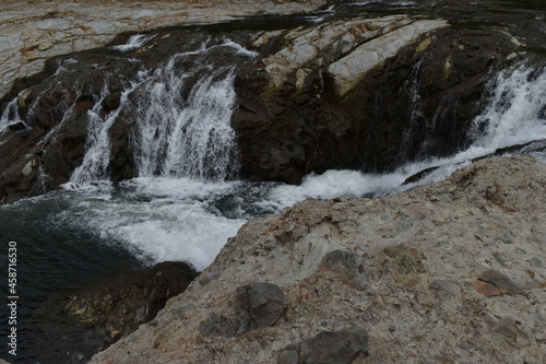 The beautiful clear waterfall along with the Makomanai river in Sapporo Japan