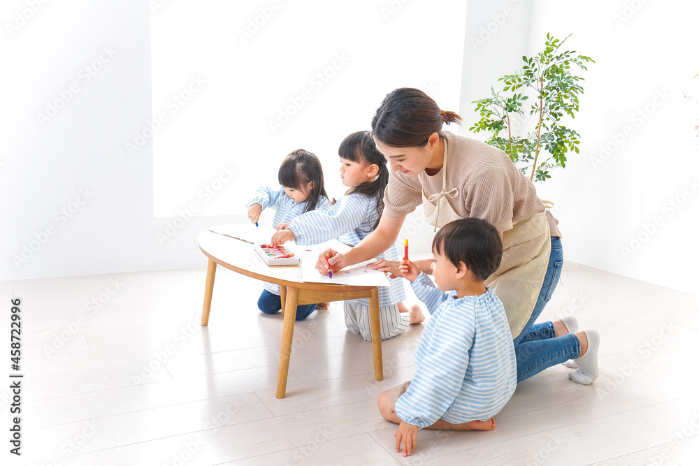 Children and teacher at kindergarten Children and teacher at kindergarten