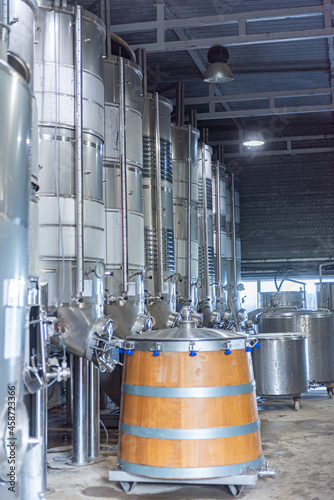 Wooden barrels and wine tanks from a Catalan winery