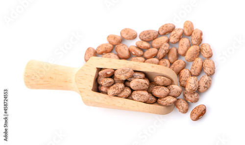 Pile of pinto beans isolated on white background.