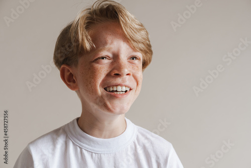 Portrait of a casual preteen boy in t-shirt standing © Drobot Dean