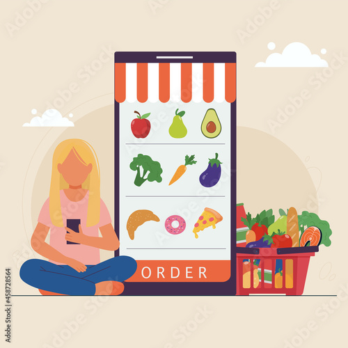 Girl ordering food online via smartphone. Buying fruits, vegetables and fast-food in internet. Meal selection in mobile application with home delivery.