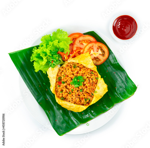 Spicy Minced Pork Cooking in Egg Wrap Thai Food Fusion Style photo