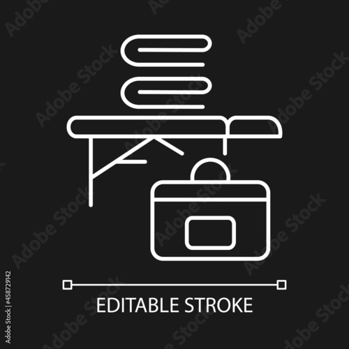 Portable massage table white linear icon for dark theme. Adjustable table for therapy. Masseur. Thin line customizable illustration. Isolated vector contour symbol for night mode. Editable stroke