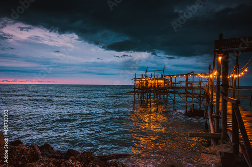 view of a Trabocco at sunset