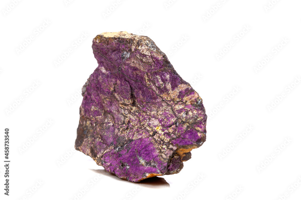 Fototapeta premium Macro mineral stone purpureus, (purple) purpurite in the breed a white background