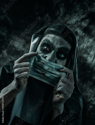 Cuadro en lienzo evil nun putting on a dirty face mask