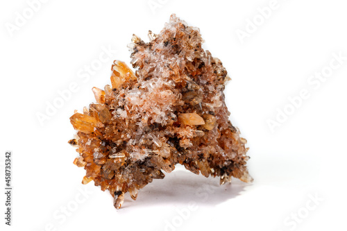 Macro of mineral stone Creedite on microcline on white background