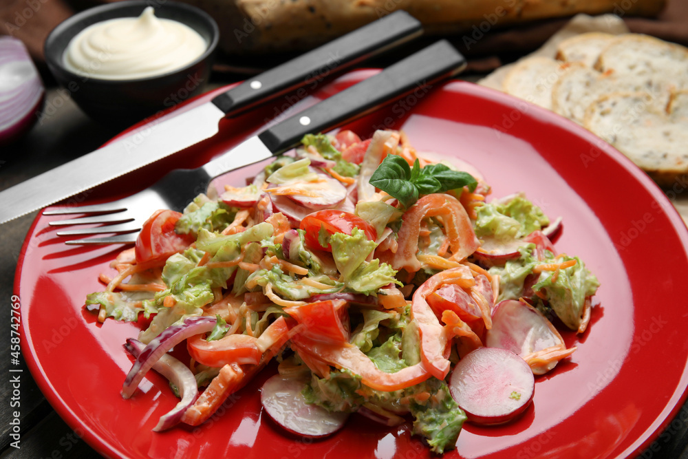 Delicious salad with mayonnaise served on table, closeup Delicious salad with mayonnaise served on table, closeup
