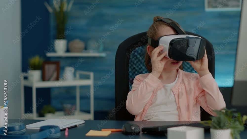 Young girl wearing vr glasses for virtual reality exercise at school