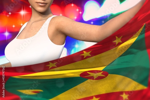 beautiful girl holds Grenada flag in front on the party lights - flag concept 3d illustration