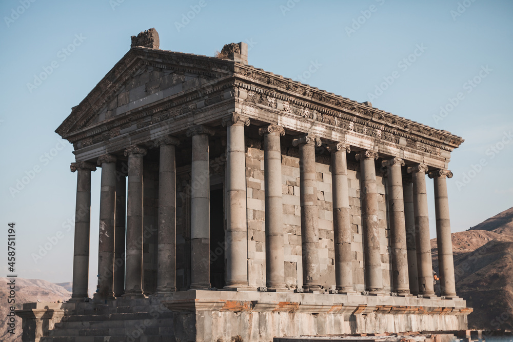 Ancient stone building with columns in Armenia. Historical heritage of Armenia. Old architecture. Sights of Europe.
