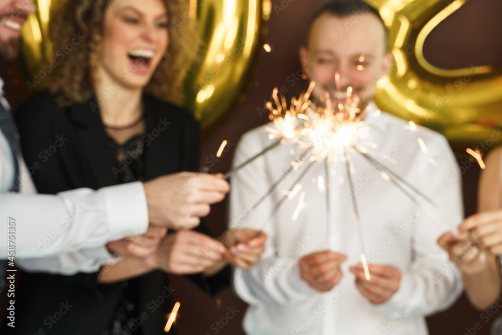 Out of focused image of people celebrating Christmas or other holiday Out of focused image of people celebrating Christmas or other holiday