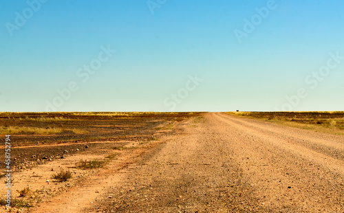 Dirt road through the Gibber Country to the Simpson Desert