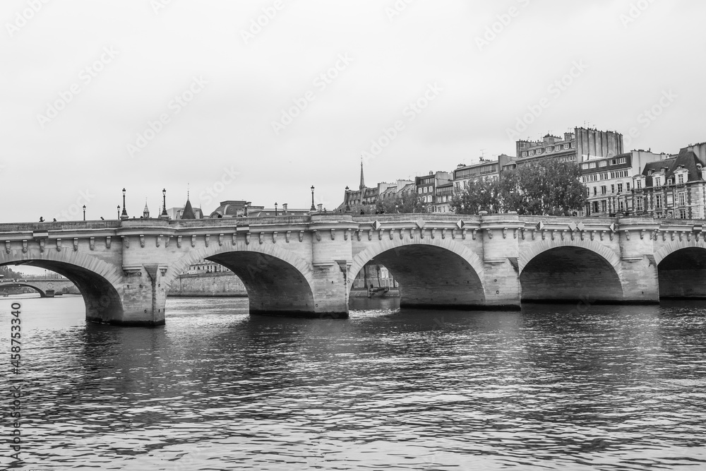 Oldest bridge in Paris. Pont-Neuf and Seine river. Paris, view of the Seine with the pont des Arts bridge