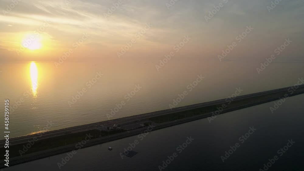 Scenic Aerial view of Saemangeum seawall at sunset. Gunsan, Korea. 새만금 방조제 Scenic Aerial view of Saemangeum seawall at sunset. Gunsan, Korea. 새만금 방조제
