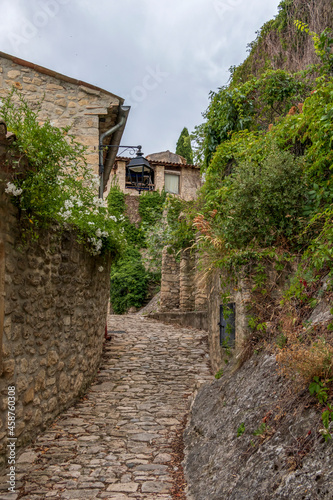 Crestet narrow street of typical provencal old town  medieval village in Vaucluse  France  Europe