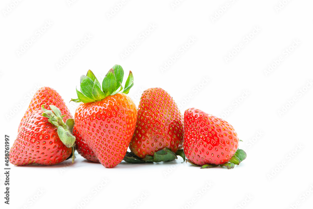 Fresh red ripe strawberries isolated on white background with copy space. Fruit have high vitamins. Fresh red ripe strawberries isolated on white background with copy space. Fruit have high vitamins.