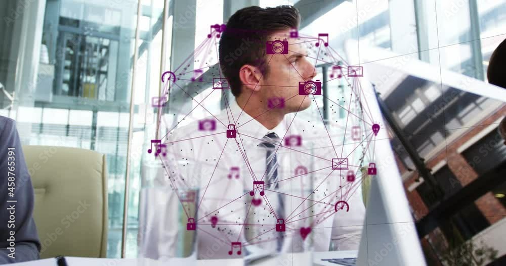 Animation of network of connections over business people in office Animation of network of connections over business people in office