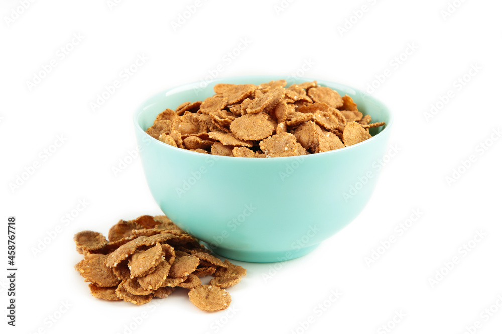 Crispy corn flakes in bowl isolated on white background. Crispy corn flakes in bowl isolated on white background.