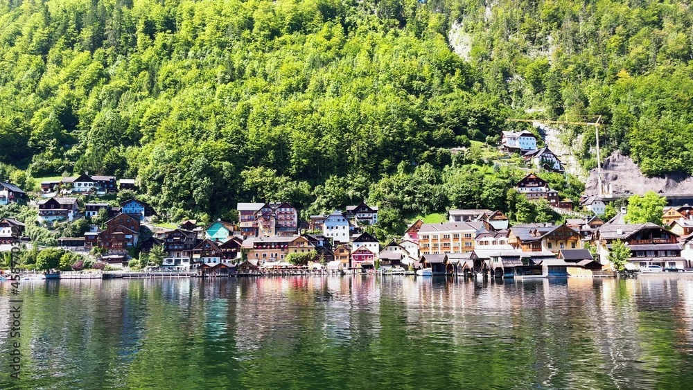 Hallstatt cityscape along a beautiful mountain lake, Austria.