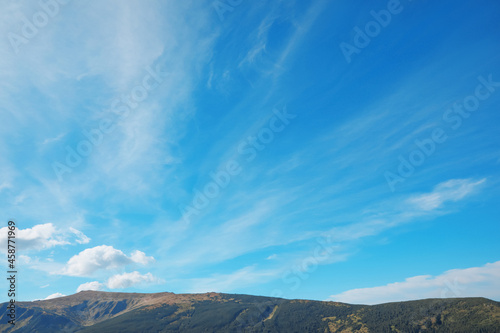 Picturesque view of sky with clouds over mountains © New Africa