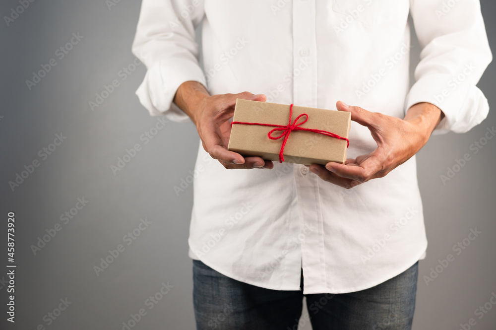 Hand holding gift box, new year gift box, Christmas gift box ,copy space. Christmas, hew year, birthday concept. Hand holding gift box, new year gift box, Christmas gift box ,copy space. Christmas, hew year, birthday concept.