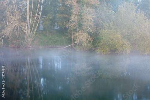 Misty river at dawn