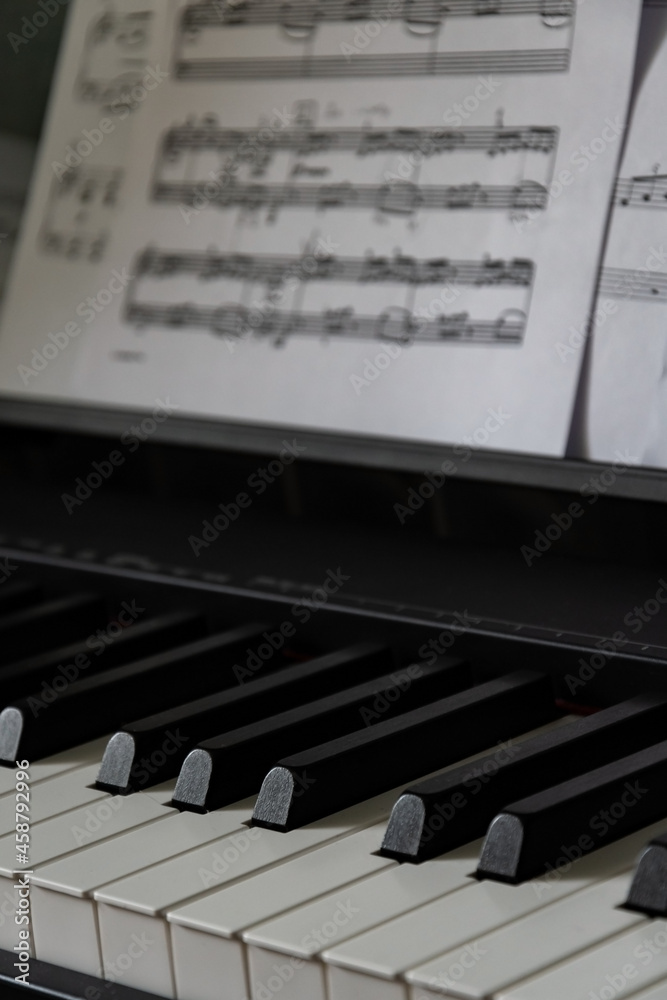 Fototapeta premium Sheet music and musical notation, beautiful works written on sheets of paper lying in disarray.