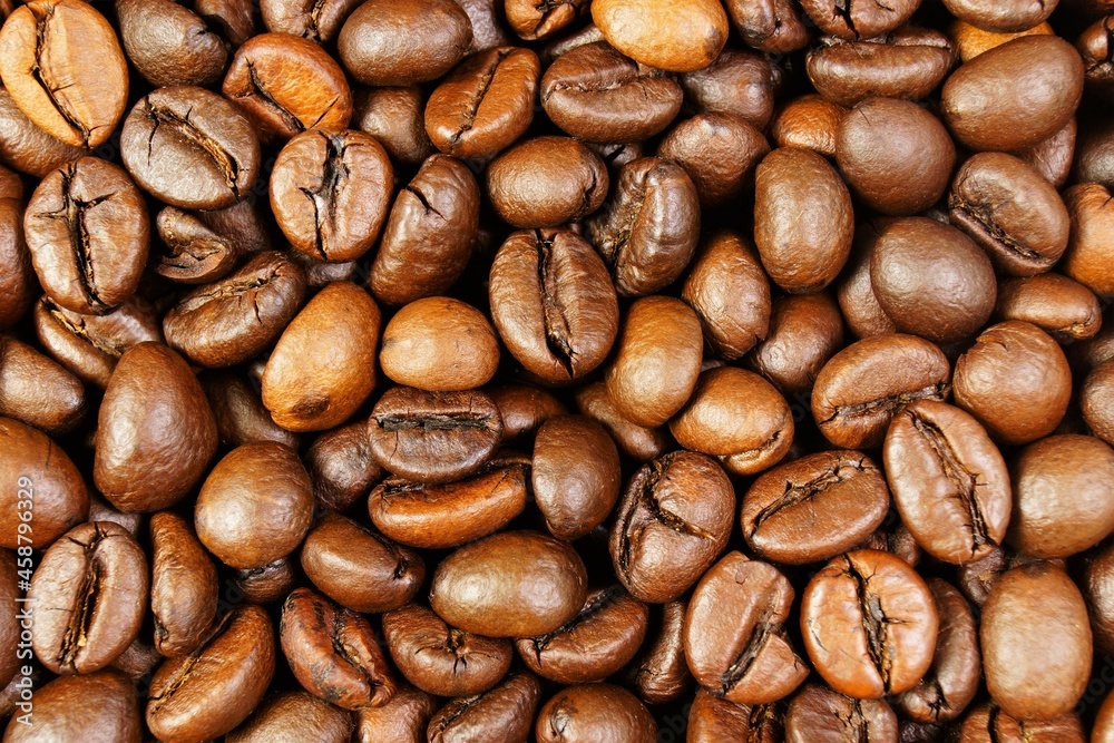 Background of coffee beans. It is popular for making a fragrant invigorating drink. Background of coffee beans. It is popular for making a fragrant invigorating drink.