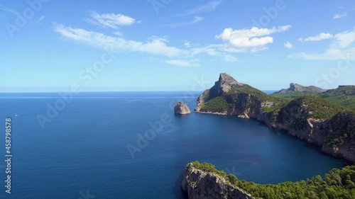 Pan shot from the Mirador Es Colomer towards the island Colomer and Punta Nau on Formentor peninsula - Mallorca, Spain