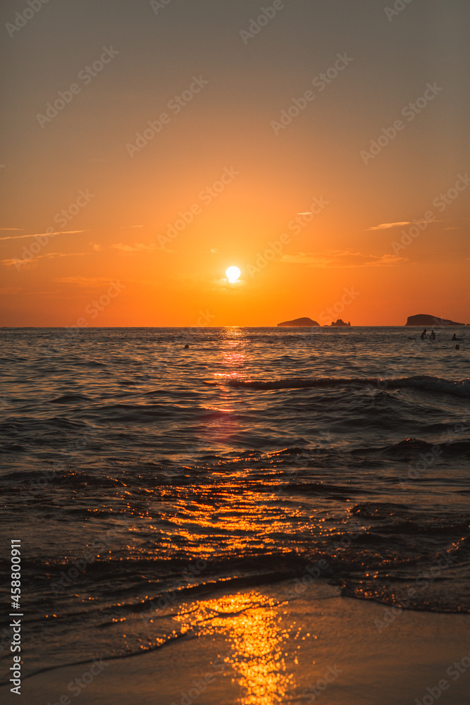Naklejka premium Amazing landscape picture with red colored sunset in Ibiza, Spain.