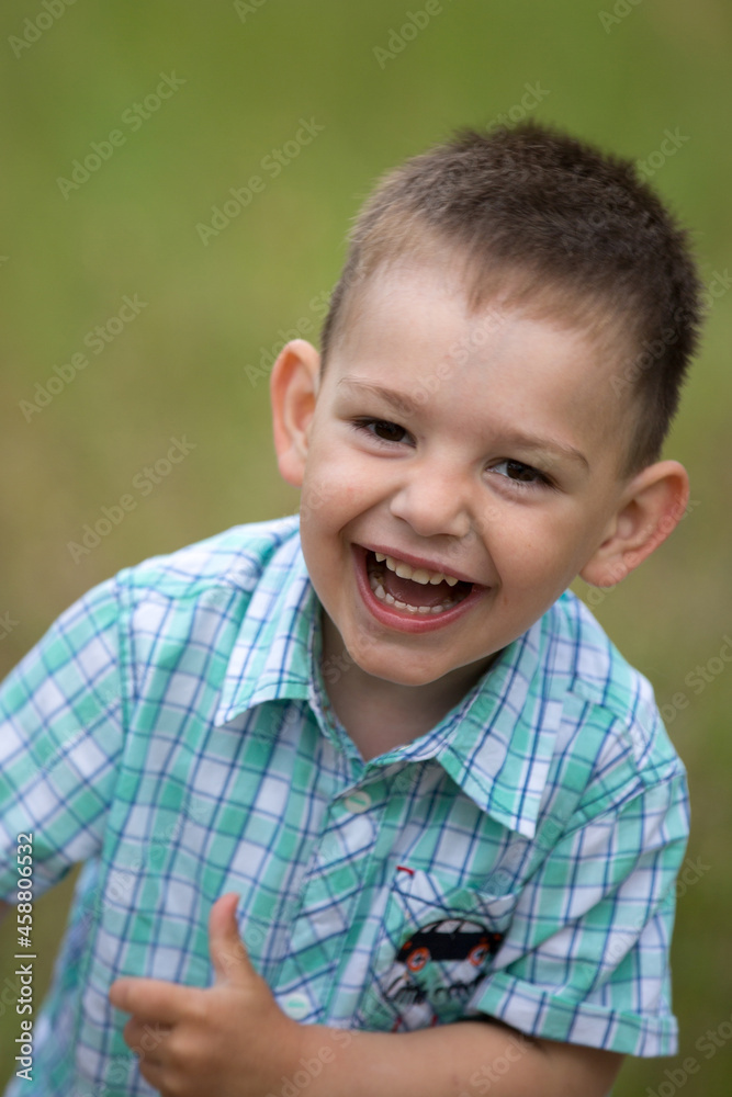 the boy runs and laughs a large portrait the boy runs and laughs a large portrait