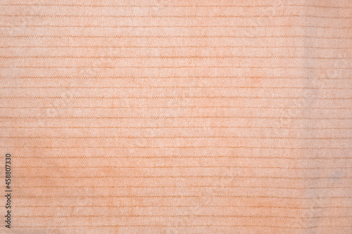 A bit creased light orange patterned linen