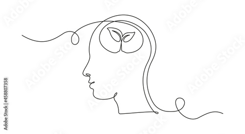 One continuous line drawing of human head with plant inside. Mental health and psychology vector concept. Creative ideas, grow up, positive thinking and self care. Growth mindset skills illustration photo