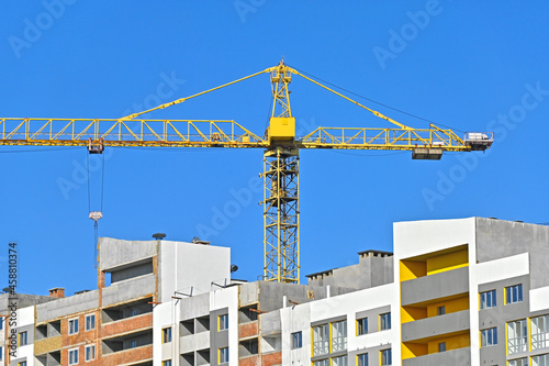 Crane and highrise construction site