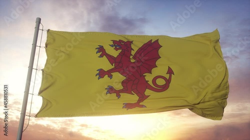 Somerset flag, England, waving in the wind, sky and sun background photo