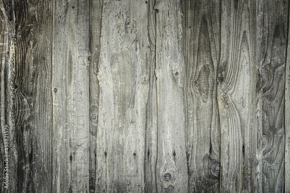 Naklejka premium old wooden boards with scratches and scuffs. vintage background for copy space