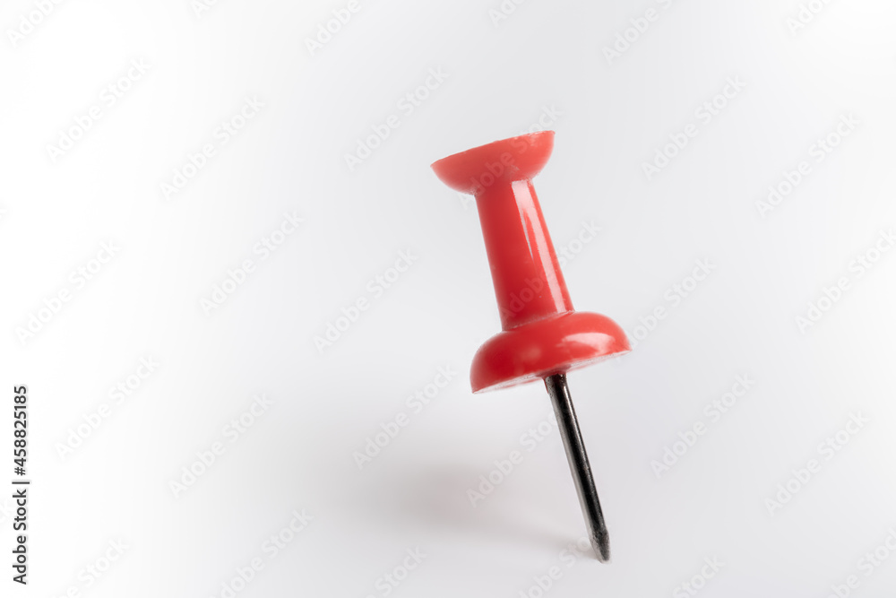 Red pin isolated on white background. Red pin isolated on white background.