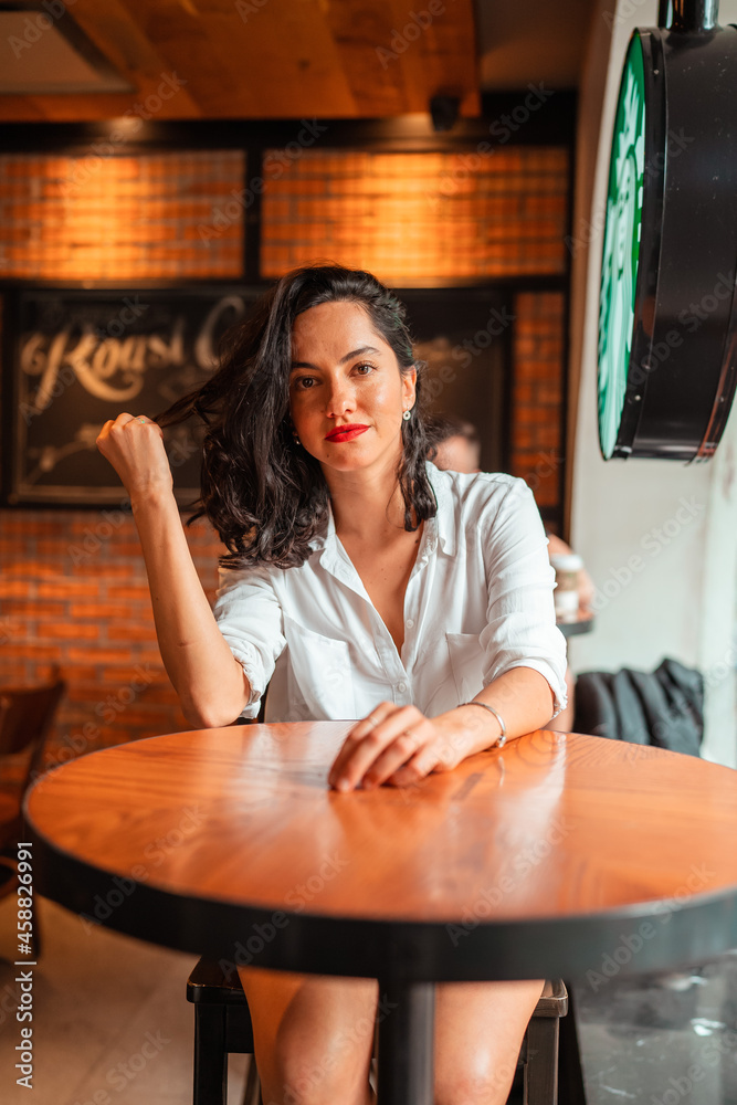 business girl sitting in a coffee shop business girl sitting in a coffee shop