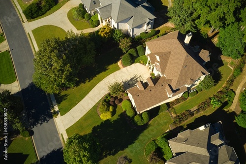 Top down view of houses in a beautiful subdivision.
